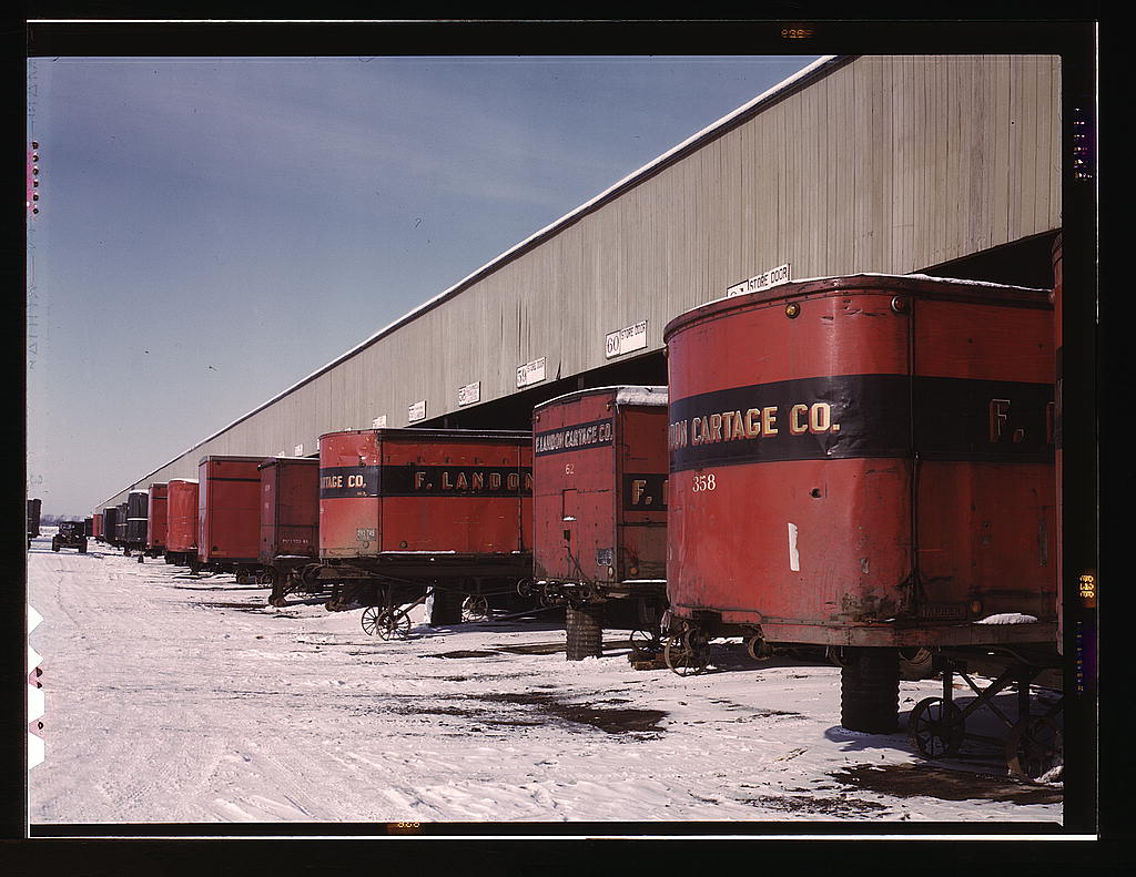 Truck trailers line up at the freight house to load and unload goods from the Chicago and Northwestern railroad, Chicago, Ill.jpg