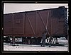 Painting a car at the repair or 'rip' tracks at North Proviso, C & NW RR., Chicago, Ill.jpg
