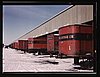 Truck trailers line up at the freight house to load and unload goods from the Chicago and Northwestern railroad, Chicago, Ill.jpg
