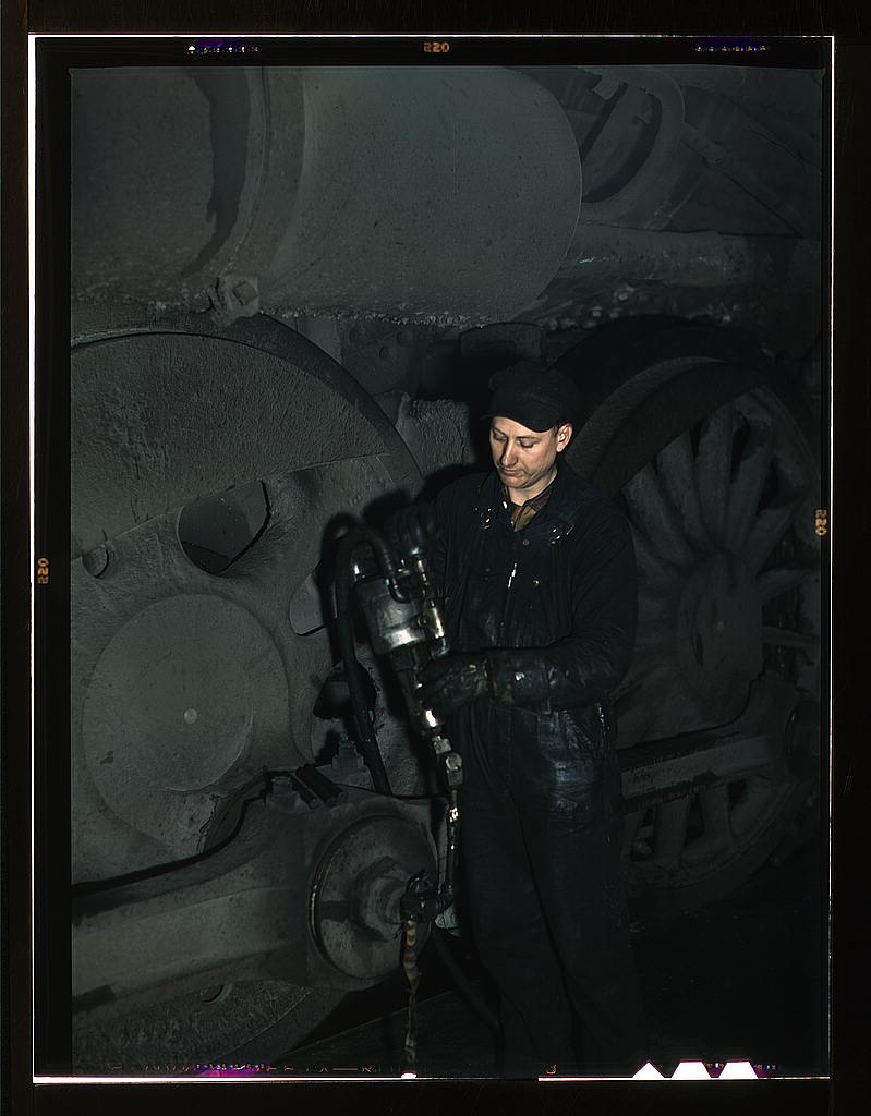 A worker in the roundhouse at the C & NW RR., Proviso yard, Chicago, Ill.1942.jpg