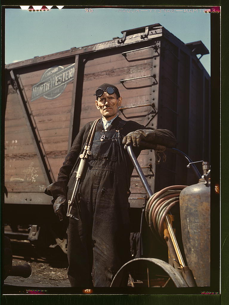 Mike Evans, a welder, at the rip tracks at Proviso yard of the C & NW RR, Chicago, Ill..jpg