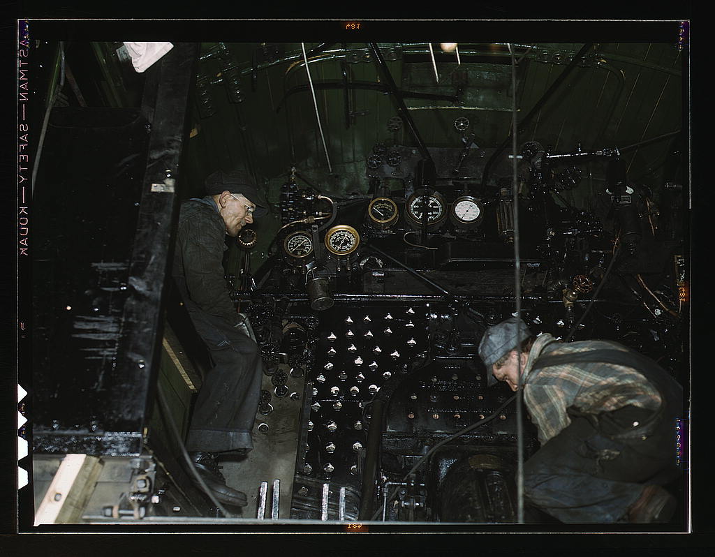 Working on the cab of a locomotive brought in for repair at the C & NW RR 40th street shops, Chicago, Ill.jpg