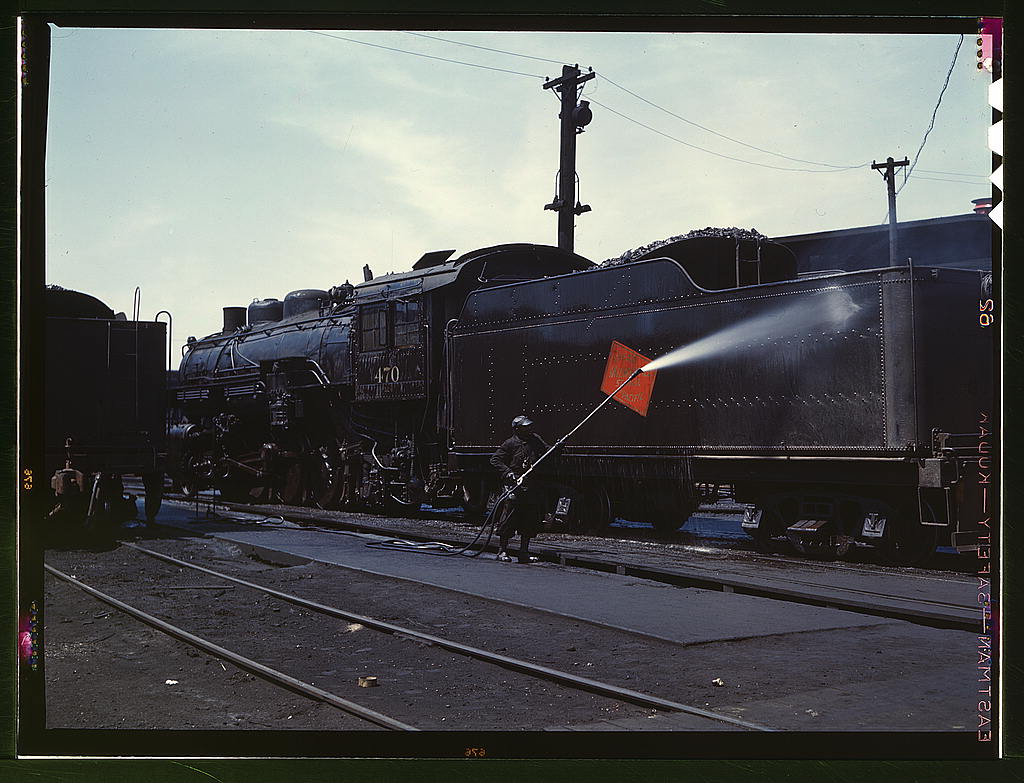 Cleaning an engine near the roundhouse, C. M. St. P. & P. R.R., Bensenville, Ill.jpg