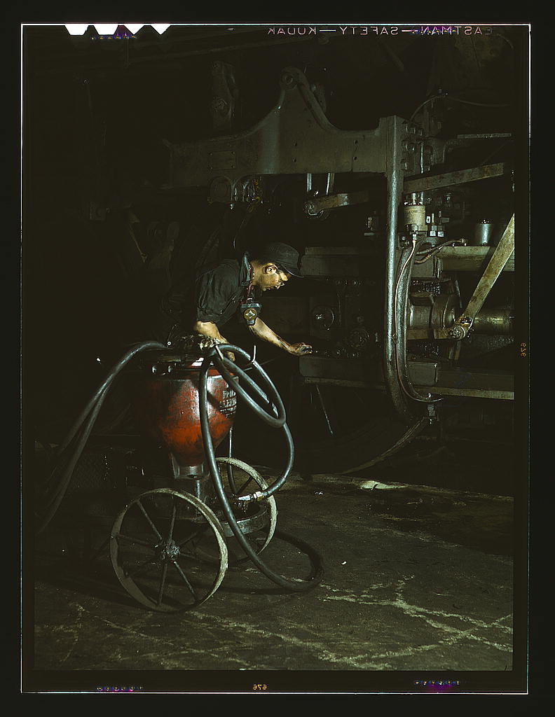Rock Island RR. Thomas Madrigal greasing a locomotive in the roundhouse, Blue Island, Ill.1943.jpg