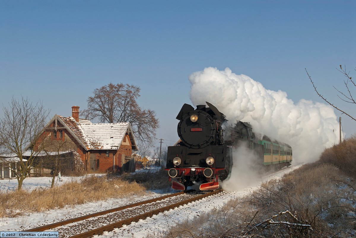 2012-02-10 10.49 Ol49-59 at Mlyniewo with Wolsztyn-bound train.jpg